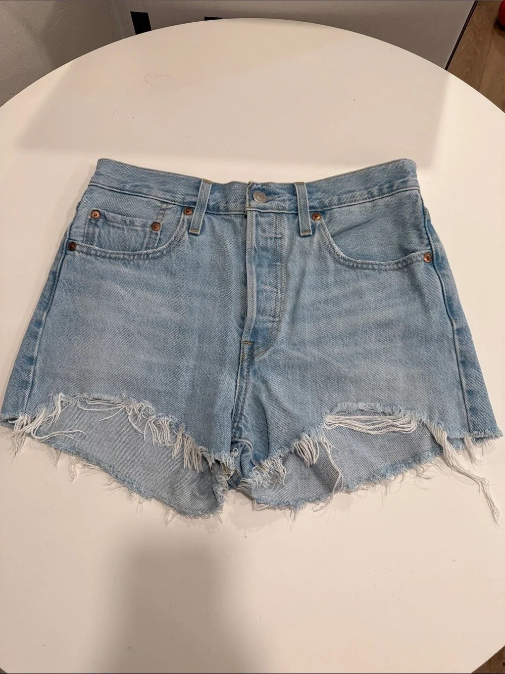 Levi’s 501 High-Rise Light Blue Distressed Denim Shorts